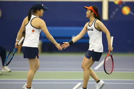 Ito and Kimoto shake hands