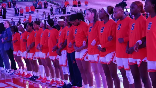 Women's basketball during anthem.