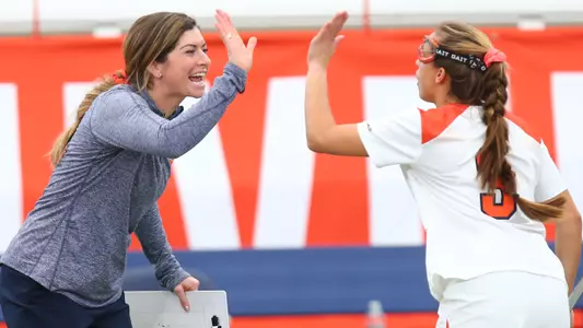 Kayla Treanor congratulates Sam Swart on a goal.