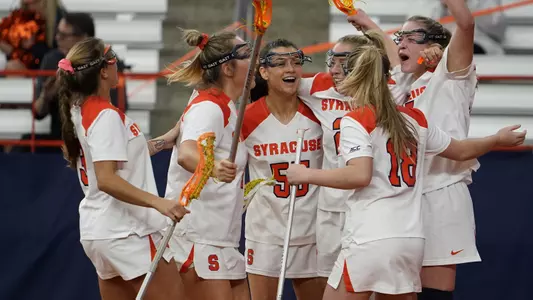 The Orange celebrate a goal.