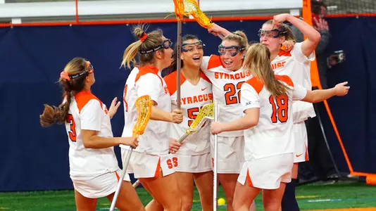 The Orange celebrate a goal.