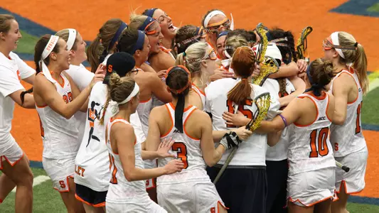 Syracuse celebrates a win in the Dome.