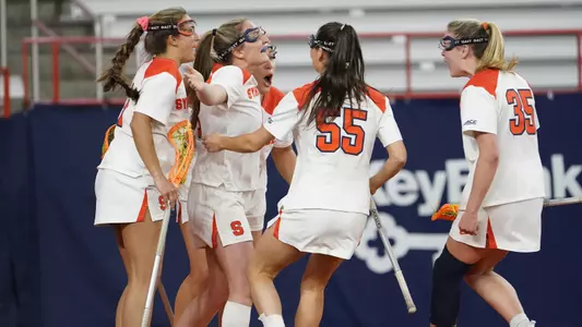The Orange celebrate a goal.