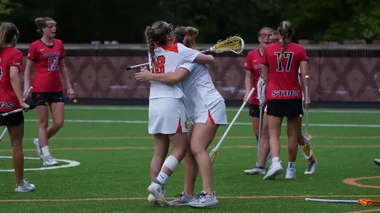 The Orange celebrate a goal versus Fairfield.