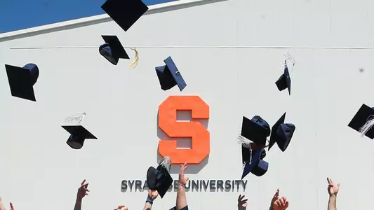 Graduation Caps in the Air