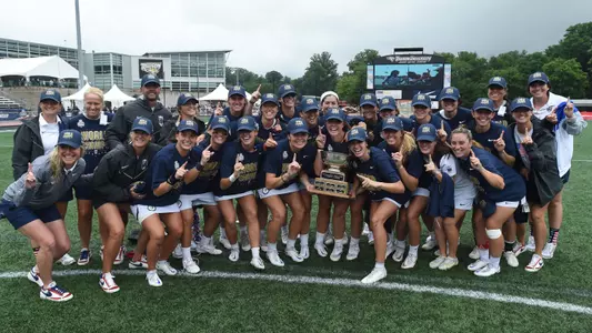 The Orange and Team USA celebrate the 2022 World Championship.