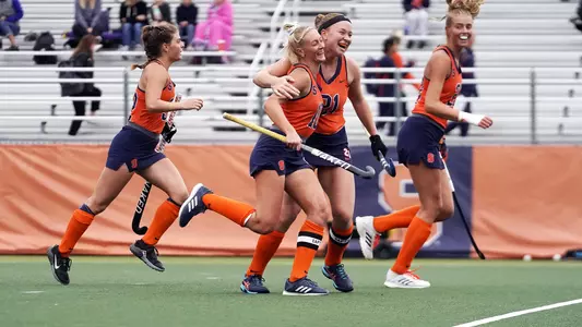 Charlotte de Vries and Eefke van den Nieuwenhof celebrate a goal in the first quarter.