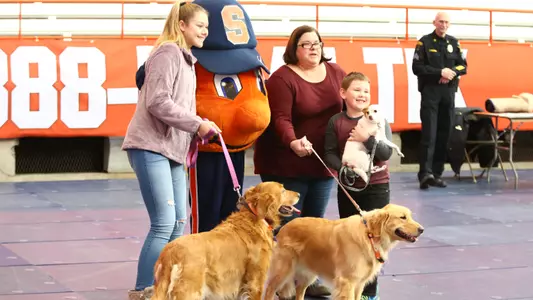 Doggy Day fans post with Otto and their dogs.