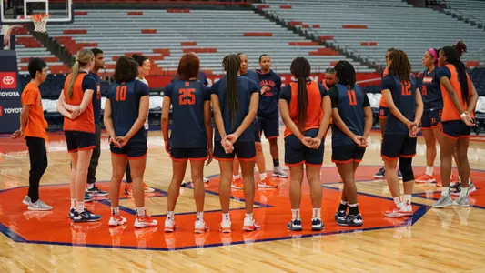 Syracuse huddles after practice on Friday afternoon