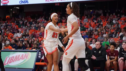 Alaina Rice high fives Cheyenne McEvans vs. Boston College