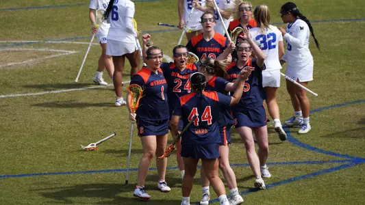 The Orange celebrate a goal against Duke.