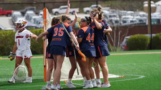 The Orange celebrate a goal against Louisville.