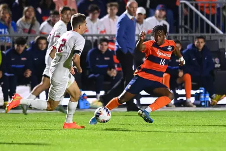 Levonte Johnson dribbles the ball in the NCAA Championship game against Indiana