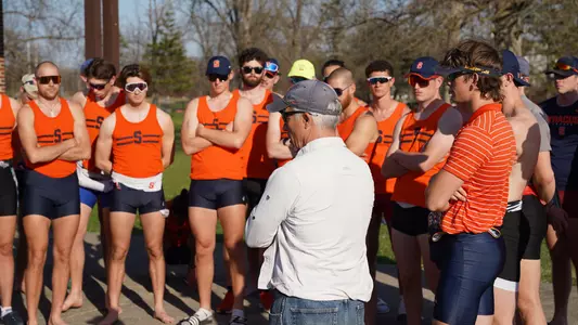 Men's rowing team huddles before practice on April 13 as Dave Reischman address the team.