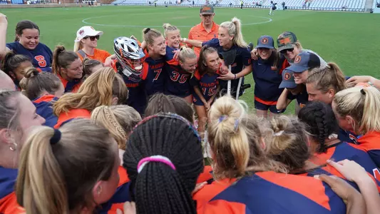 The 2023 Orange celebrate a victory.