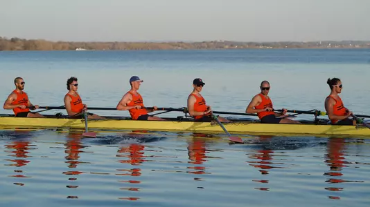 Men's Rowing Varsity 8 practices on Lake Onondaga
