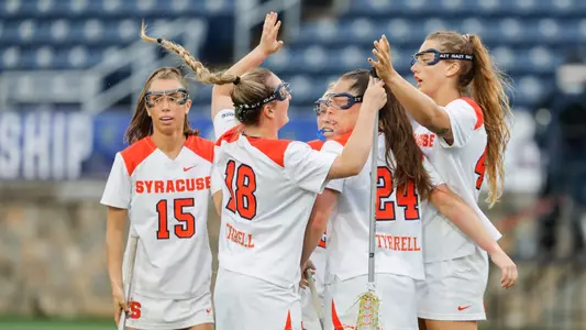 The Orange celebrate a goal in the quarterfinals of the ACC Tournament.