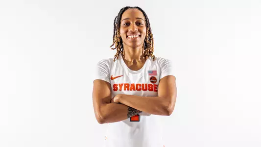 Dominique Camp poses in a Syracuse uniform