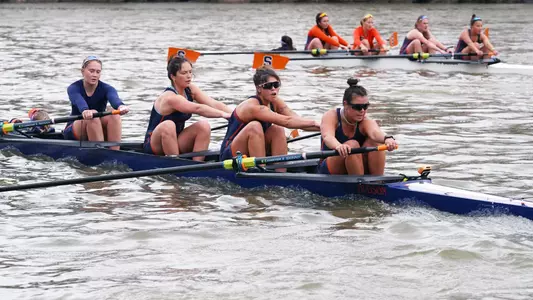 Varsity four and second varsity four at practice