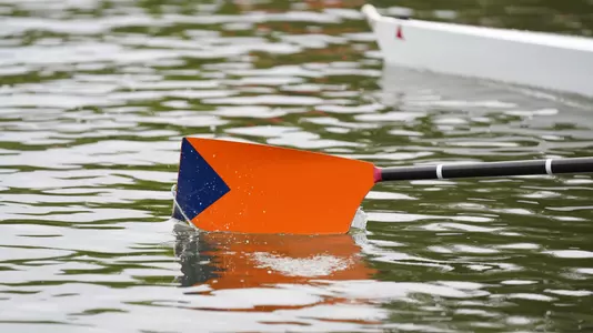 Syracuse oar glides over the water.