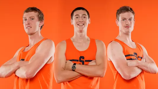 Men's Rowers Lachlan Doust, Joe Willis and Sean McHugh pose in their Syracuse racing shirts.