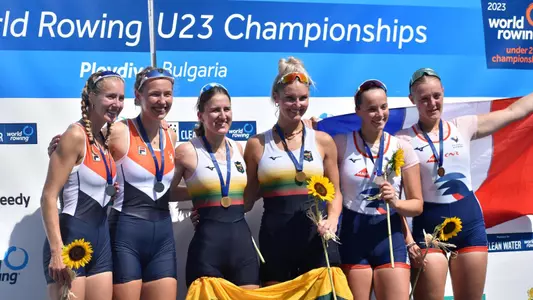 Kamile Kralikaite and Martyna Kazlauskaite on the medal podium at the 2023 U23 World Championships. The pair won gold.