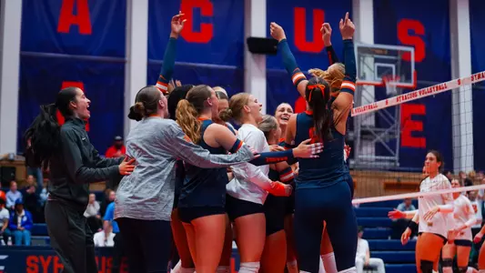 Volleyball match point celebration vs. Notre Dame
