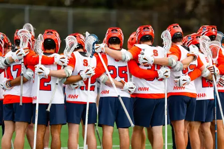 Men's lacrosse huddle vs Air Force