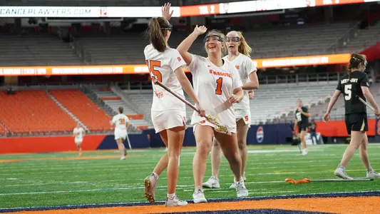 The Orange celebrate a goal.