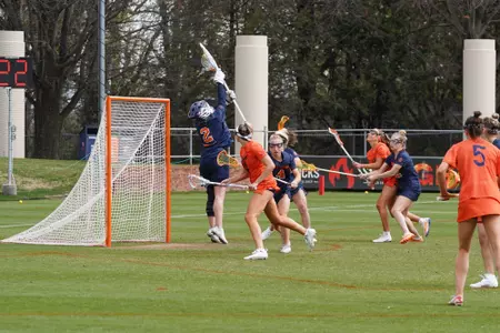 Delaney Sweitzer makes a save against Virginia.