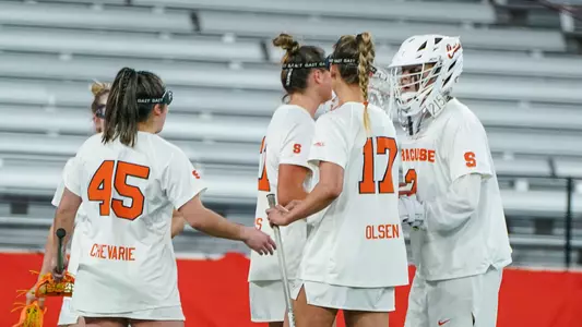 The Orange defense prepares for action.