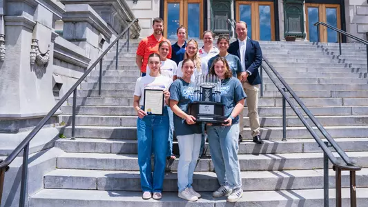 Student-athletes and coaches with the 2024 Onondaga County Legislature Gold Seal