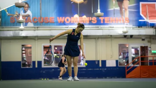 Miyuka Kimoto preparing to serve