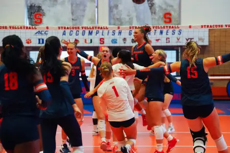 Volleyball celebrates win vs. Iowa State