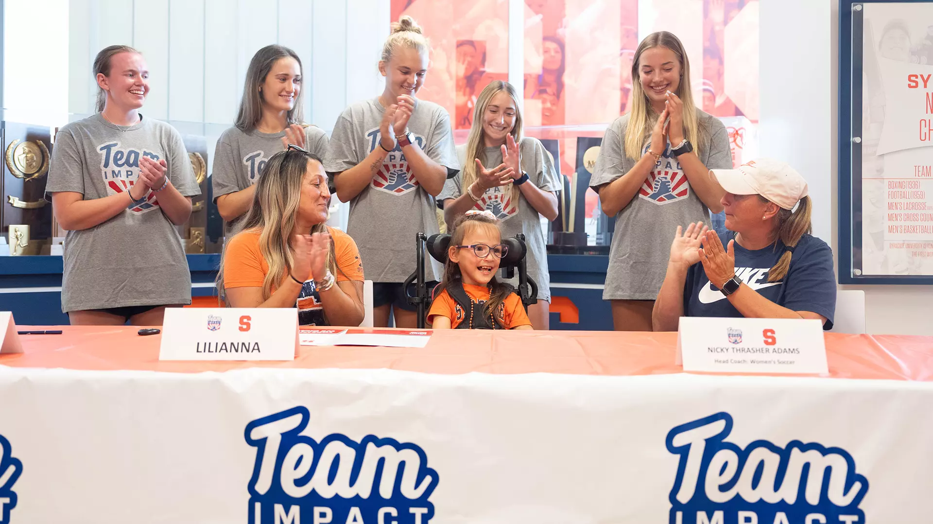 Lilianna receives congratulatory applause after signing with the Syracuse women's soccer team!