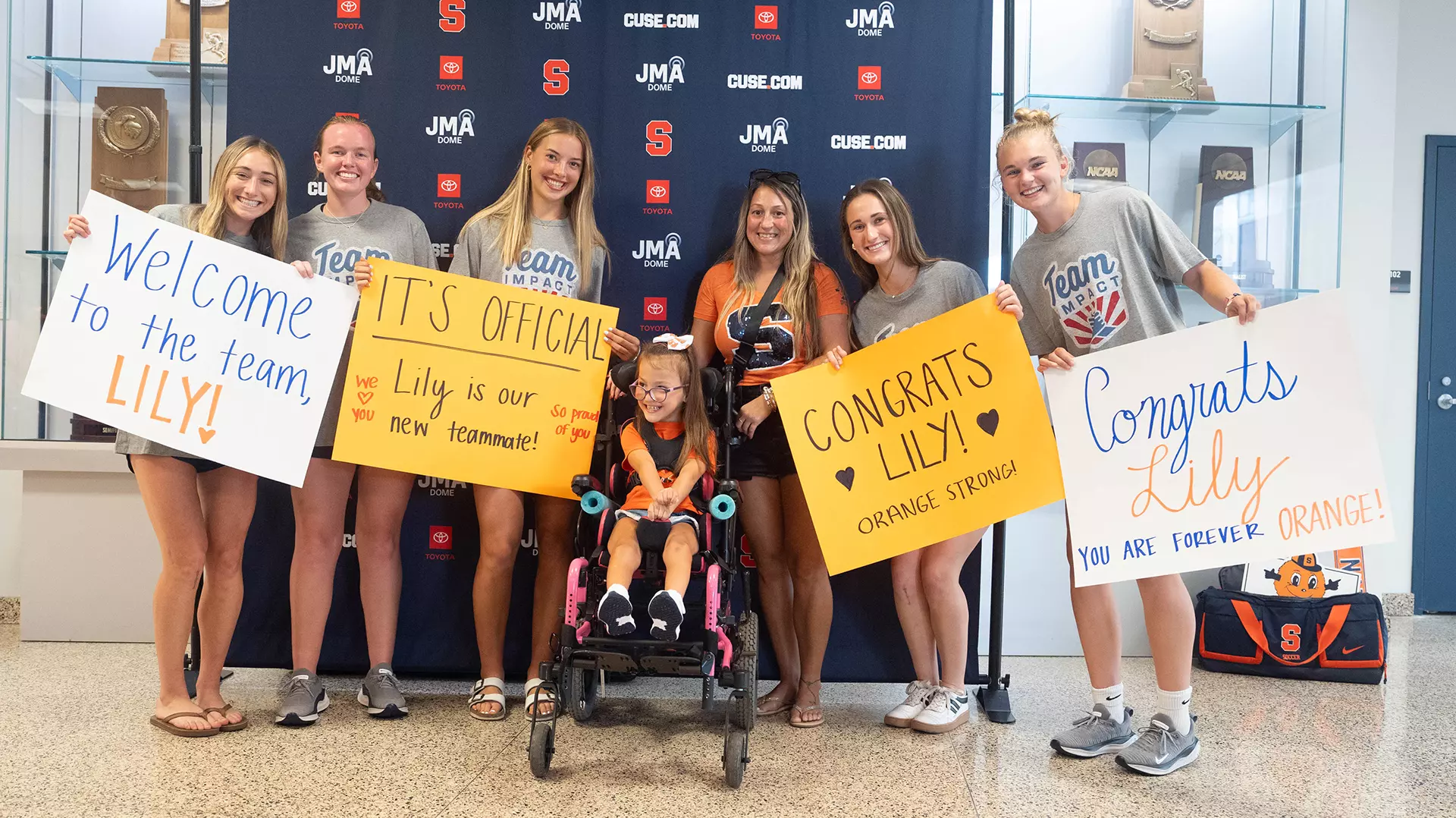 Syracuse soccer players brought the signs out to celebrate Lilianna signing with the Orange!