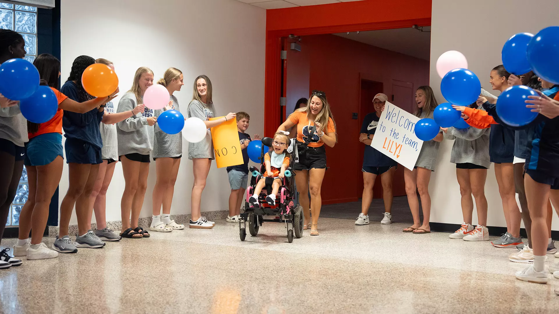 Lilianna Cavallo is greeted by the Syracuse women's soccer team on her signing day