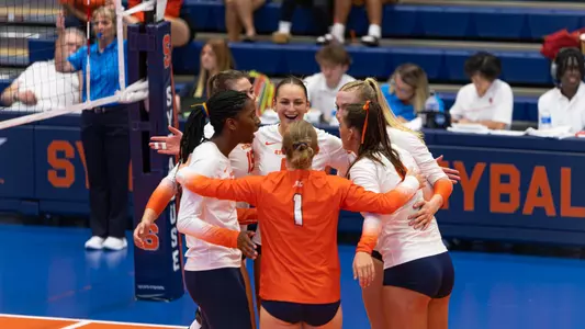 Volleyball huddle vs. Cornell