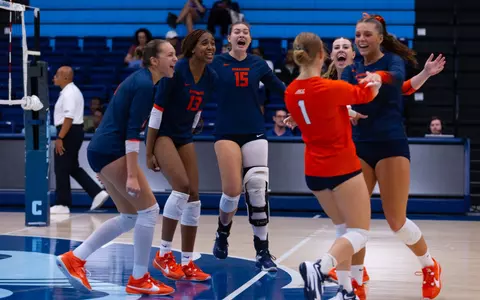 Volleyball celebration vs. Manhattan