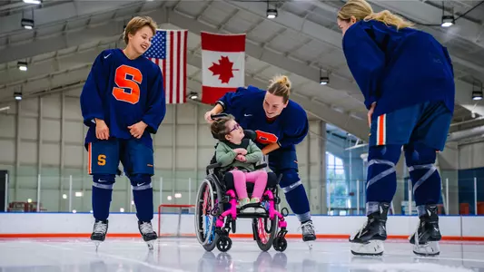 Emmy from Team IMPACT and Syracuse Ice Hockey