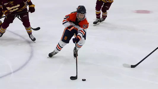 Peyton Armstrong with Puck