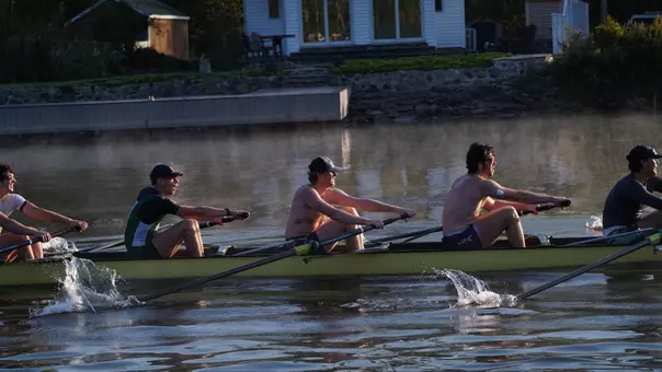 Men's rowing practicing on the Lysander river