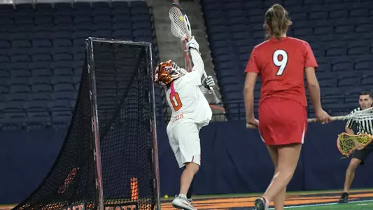 Daniella Guyette makes one of her 14 saves against Cornell.