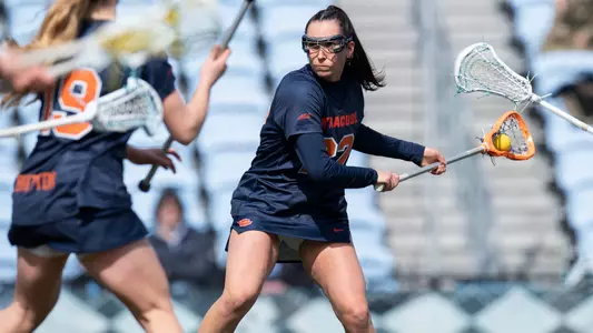 Molly Guzik scored two goals at #2 North Carolina.