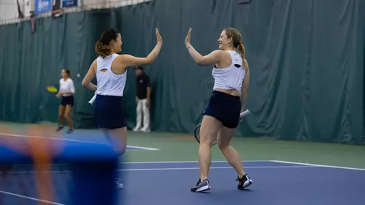 Nelly Knezkova and Miyuka Kimoto doubles celebration vs. Duke