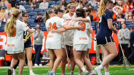 The Orange celebrate a goal.