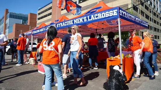 Syracuse fans tailgating in the lots outside of the JMA Dome
