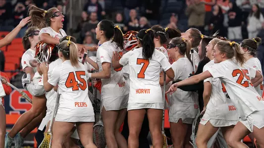 Syracuse celebrates a victory.