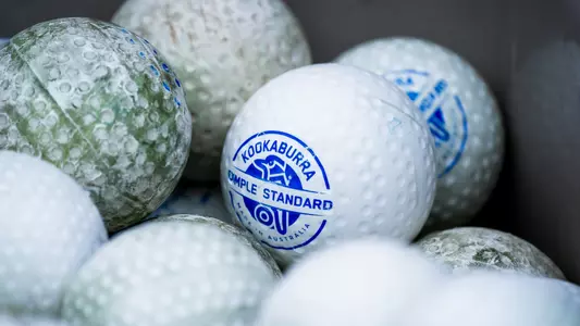 Closeup of white Kookaburra field hockey ball