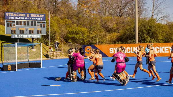 Syracuse field hockey celebrates a shootout win over Cal
